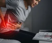 Dor na coluna que irradia para a barriga: descubra as causas e quando se preocupar